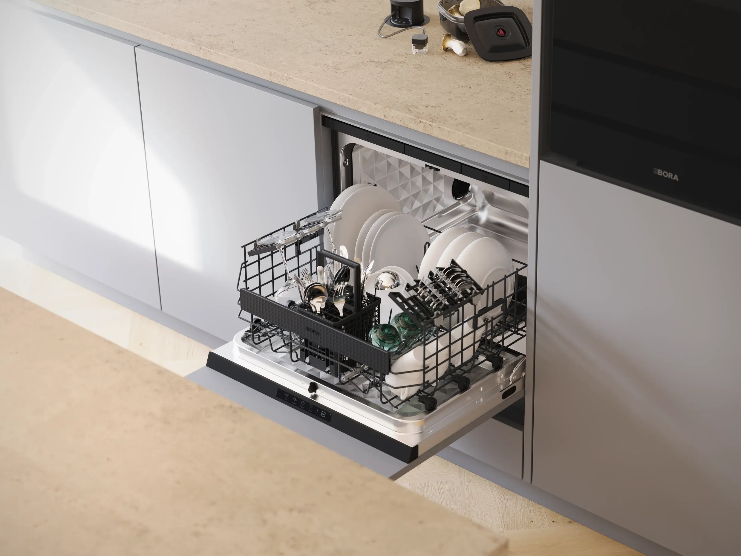 BORA Dish with its rack pulled out under a kitchen worktop