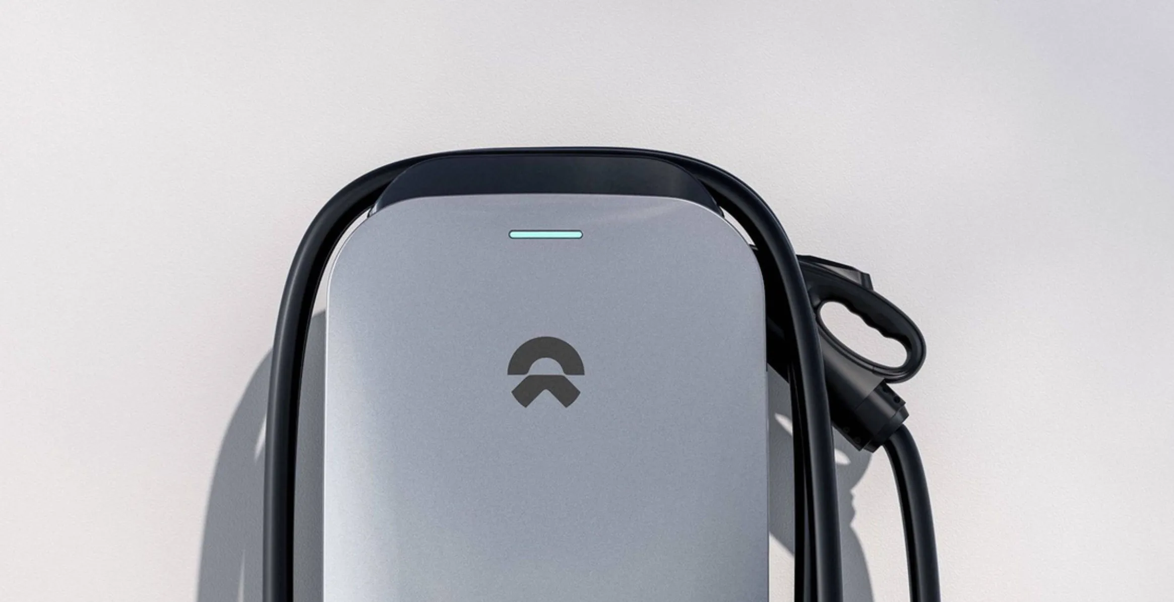 Front view of the NIO home charger with its cable